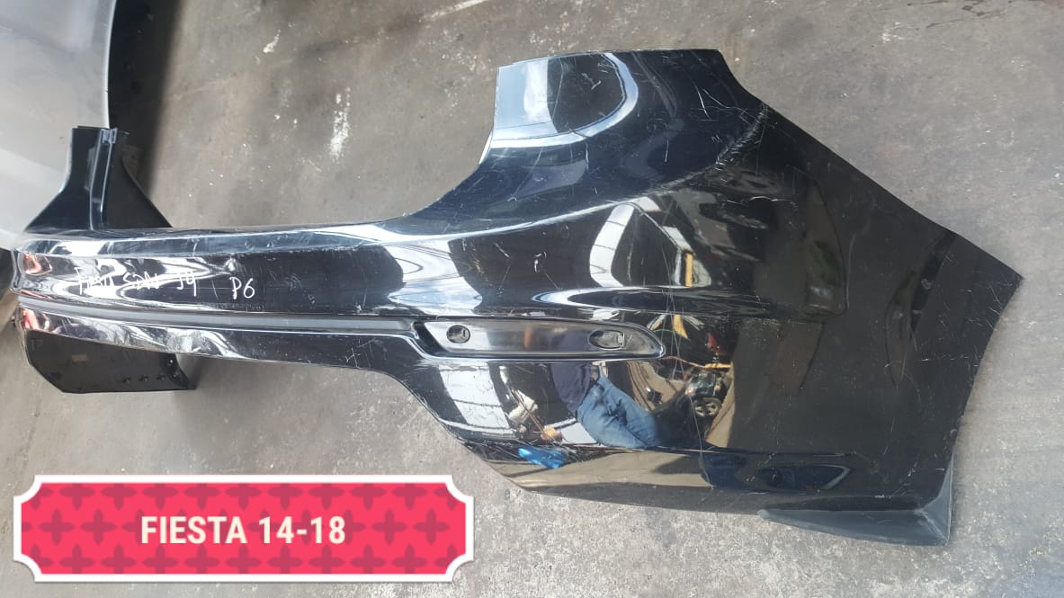 PARACHOQUES POSTERIOR FORD FIESTA SEDAN 2014 AL 2018